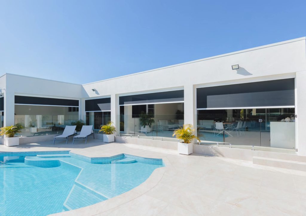 outdoor blinds by the pool area